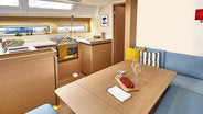 Sun Odyssey 490 interior kitchen and dining area